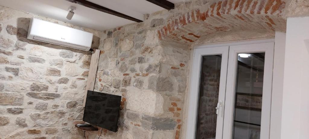 TV a/nebo společenská místnost v ubytování APARTMAN B