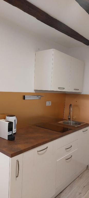 Kuchyň nebo kuchyňský kout v ubytování APARTMAN B