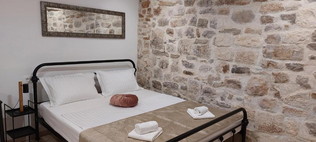 Postel nebo postele na pokoji v ubytování APARTMAN B