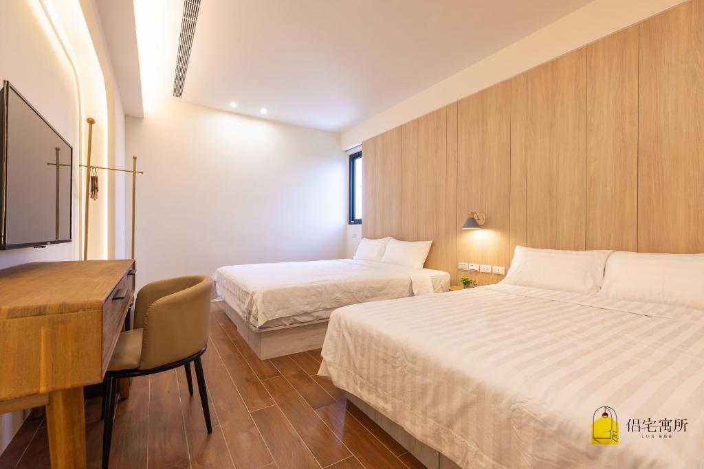 Postel nebo postele na pokoji v ubytování Lu's B&B