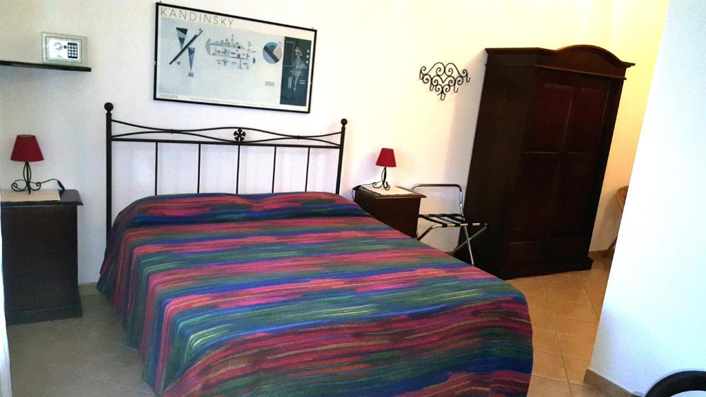 Postel nebo postele na pokoji v ubytování B&B Brezza di Mare (Sea Breeze)