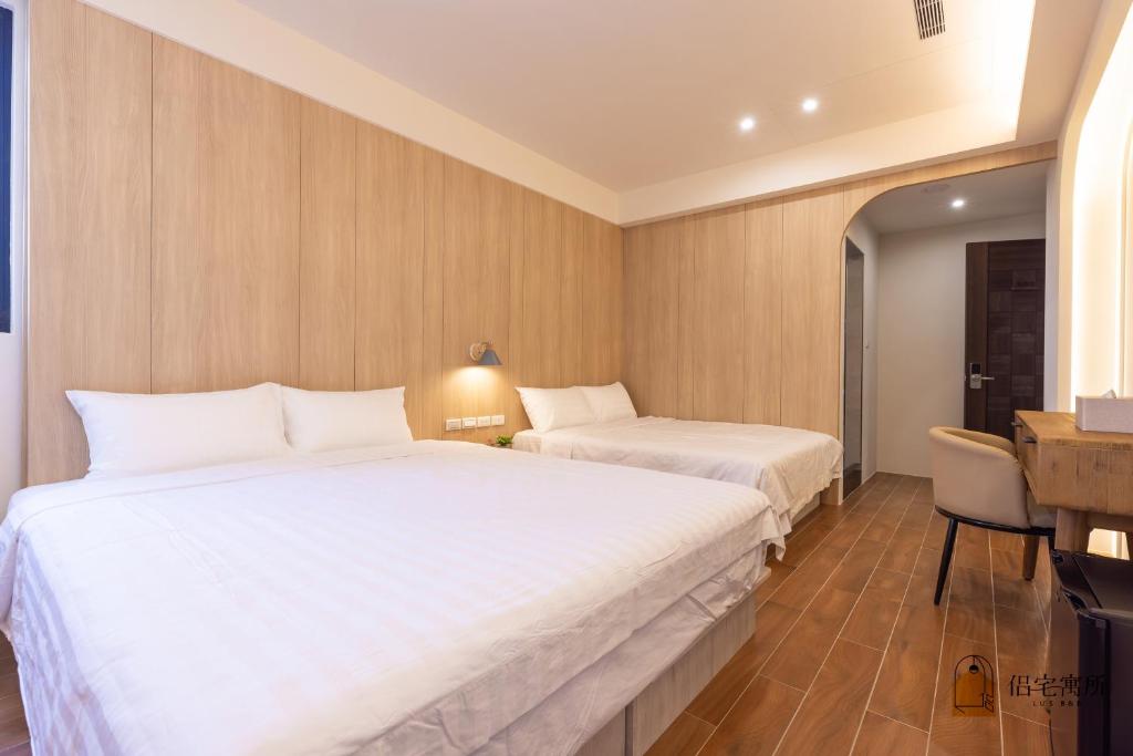 Postel nebo postele na pokoji v ubytování Lu's B&B