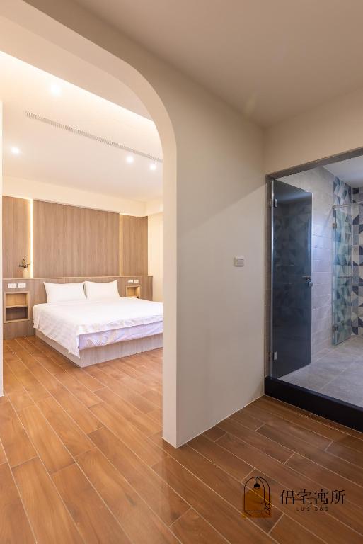 Postel nebo postele na pokoji v ubytování Lu's B&B