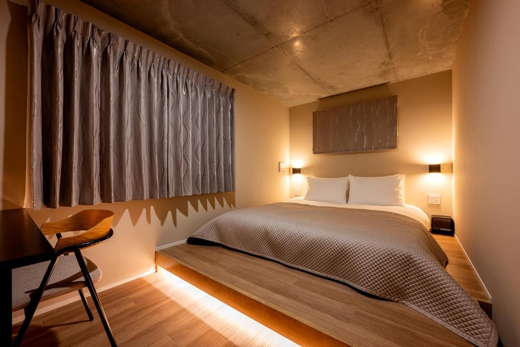 Tempat tidur dalam kamar di R.Kamakura