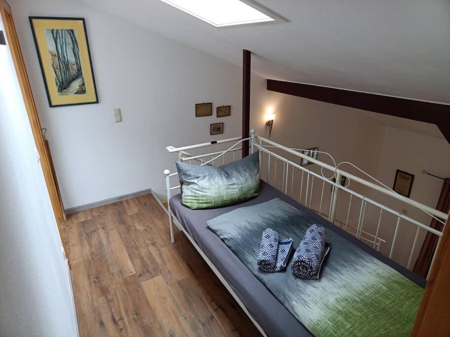 Postel nebo postele na pokoji v ubytování Art House by Dimai