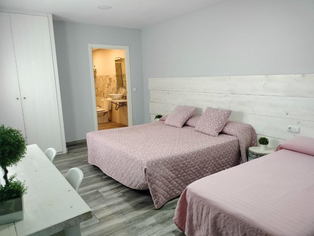 Cama o camas de una habitación en Posada de la plata