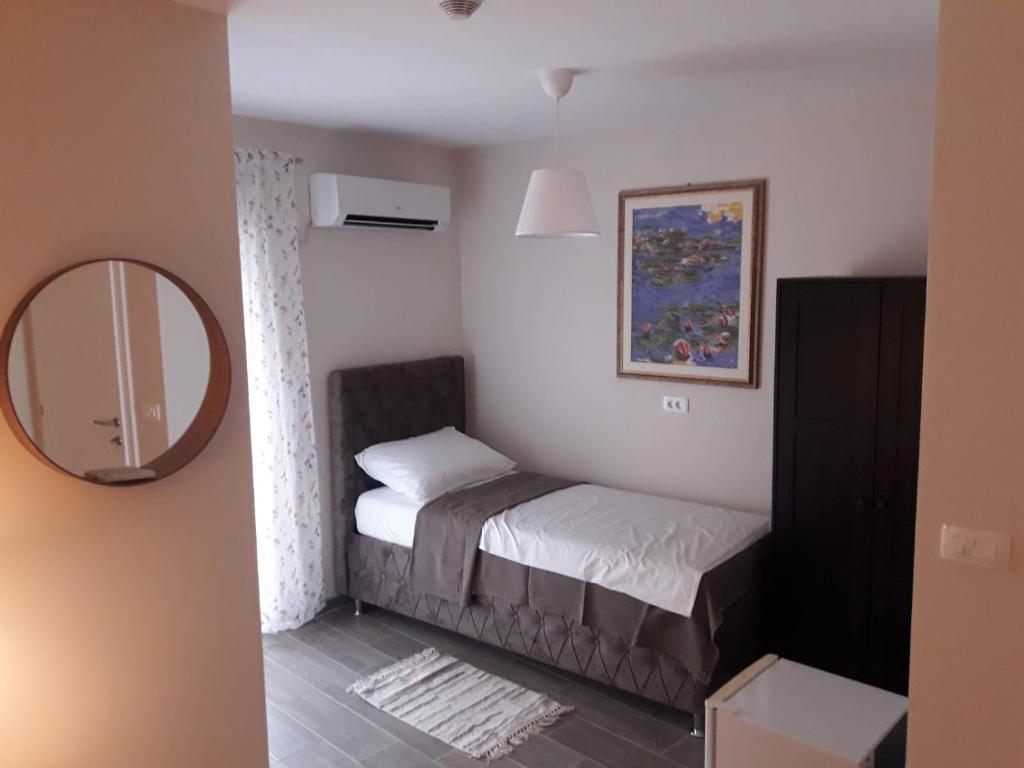 Postel nebo postele na pokoji v ubytování Portofino - With Free Parking