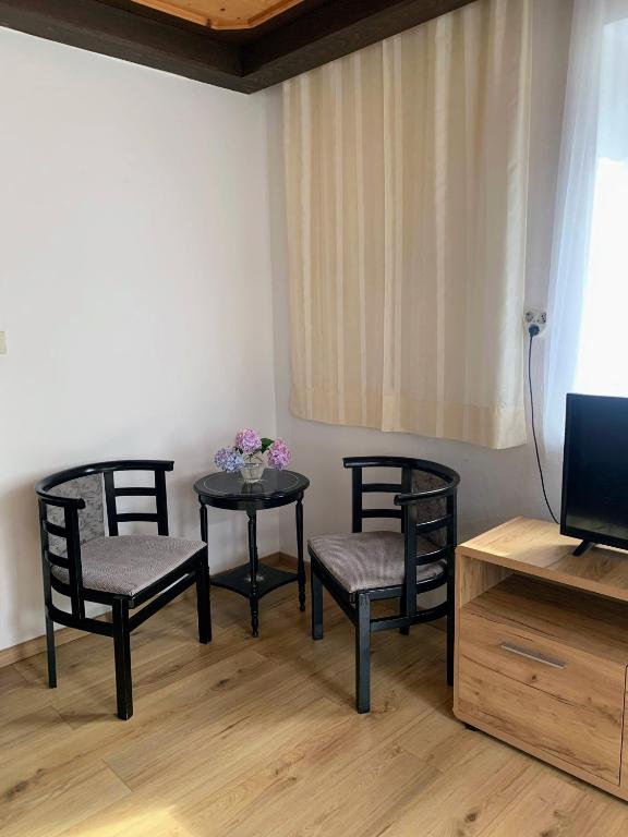 TV a/nebo společenská místnost v ubytování Appartements Konrad
