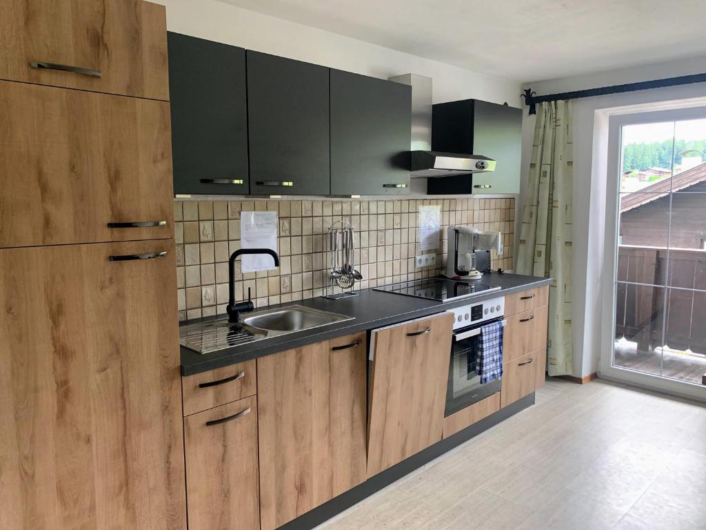 Kuchyň nebo kuchyňský kout v ubytování Appartements Konrad