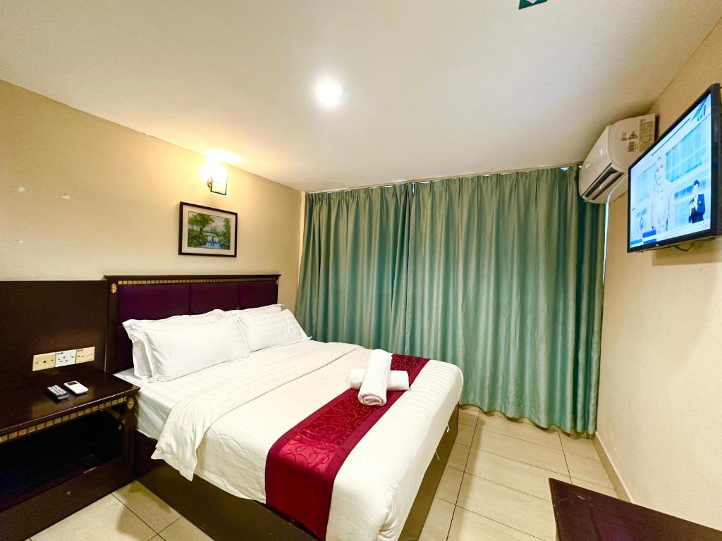 Postel nebo postele na pokoji v ubytování VALLEY HOTEL