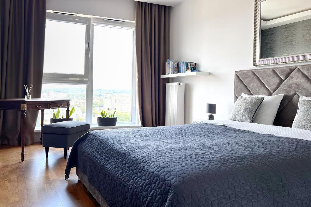 Легло или легла в стая в Capital Towers - Apartament Red z widokiem na panoramę miasta i rzekę