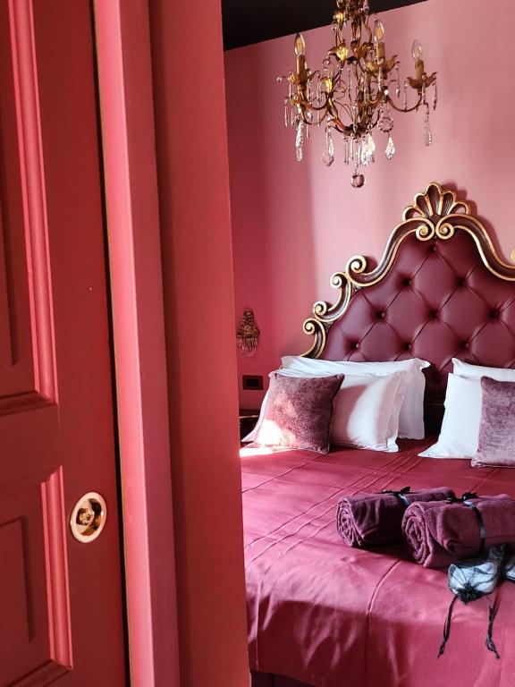 Postel nebo postele na pokoji v ubytování Hotel Zia Piera