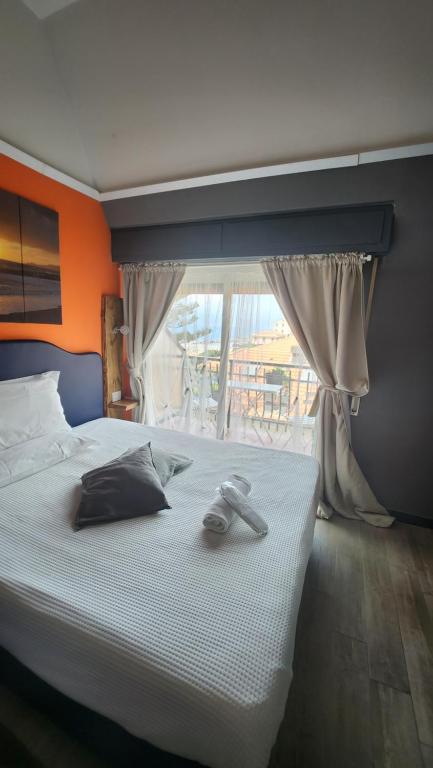 Postel nebo postele na pokoji v ubytování Hotel Zia Piera