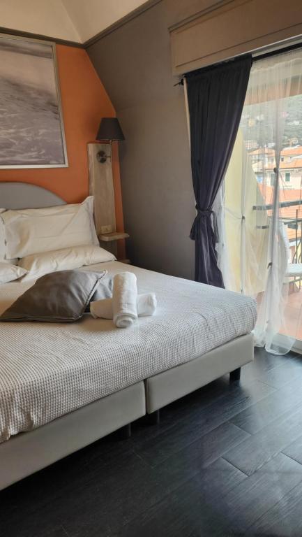 Postel nebo postele na pokoji v ubytování Hotel Zia Piera