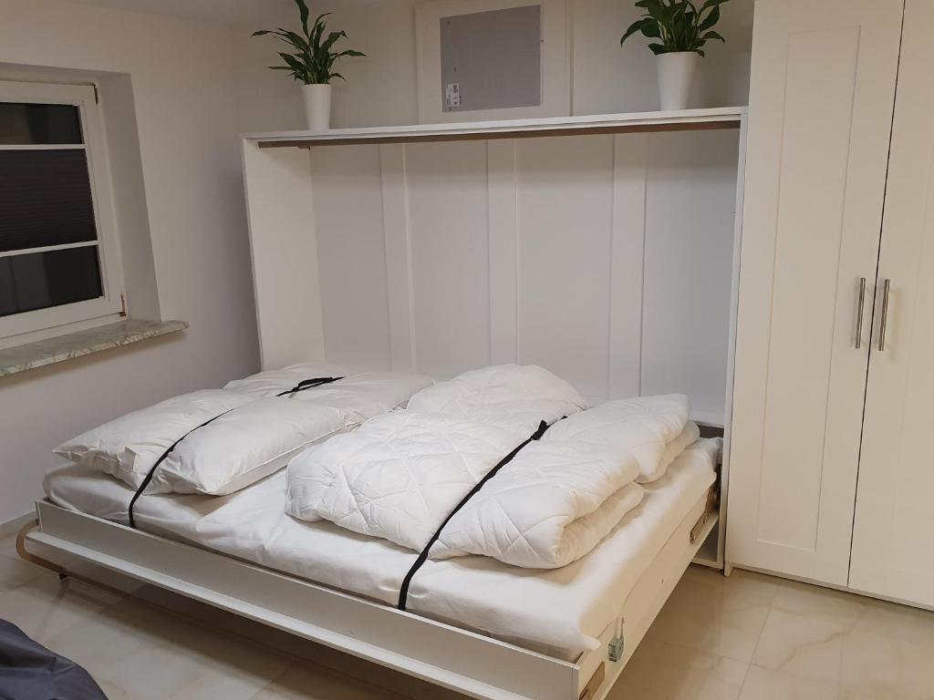 Postel nebo postele na pokoji v ubytování Mikes Fewo