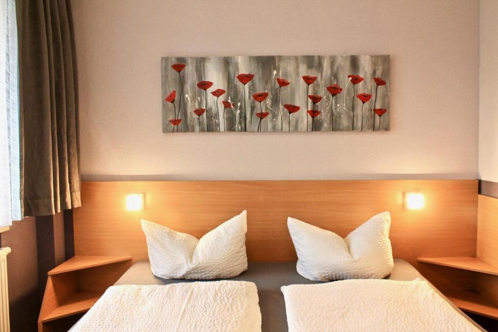 Postel nebo postele na pokoji v ubytování Hotel Carolaruh