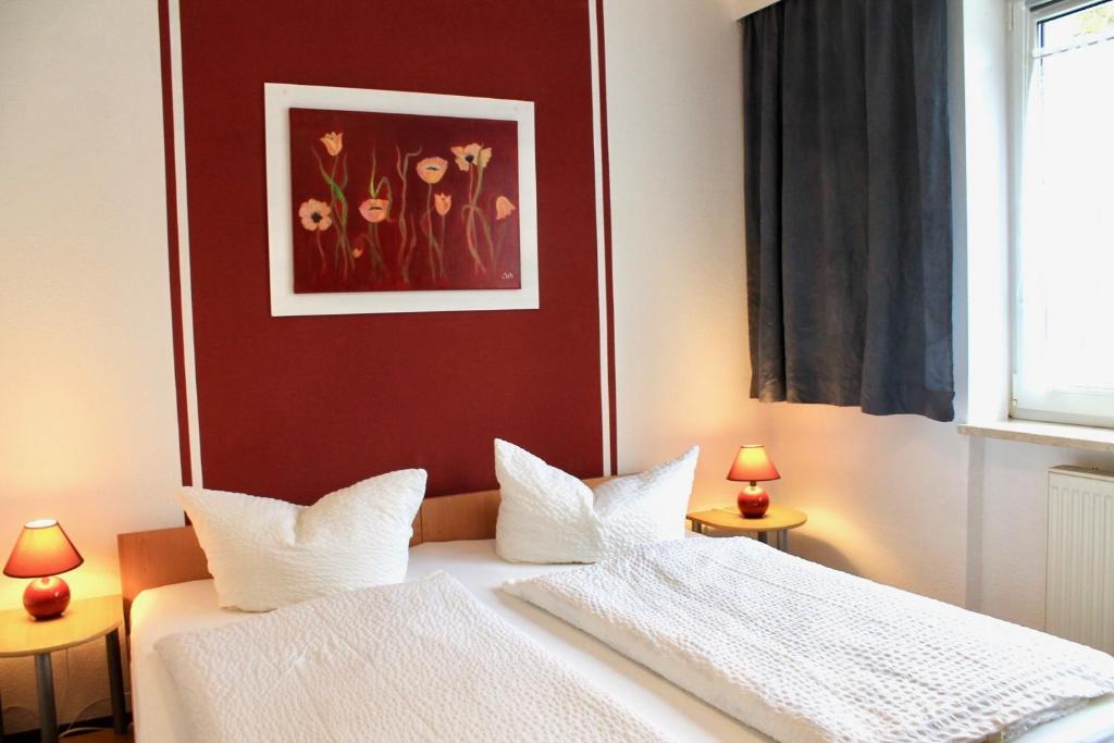 Postel nebo postele na pokoji v ubytování Hotel Carolaruh