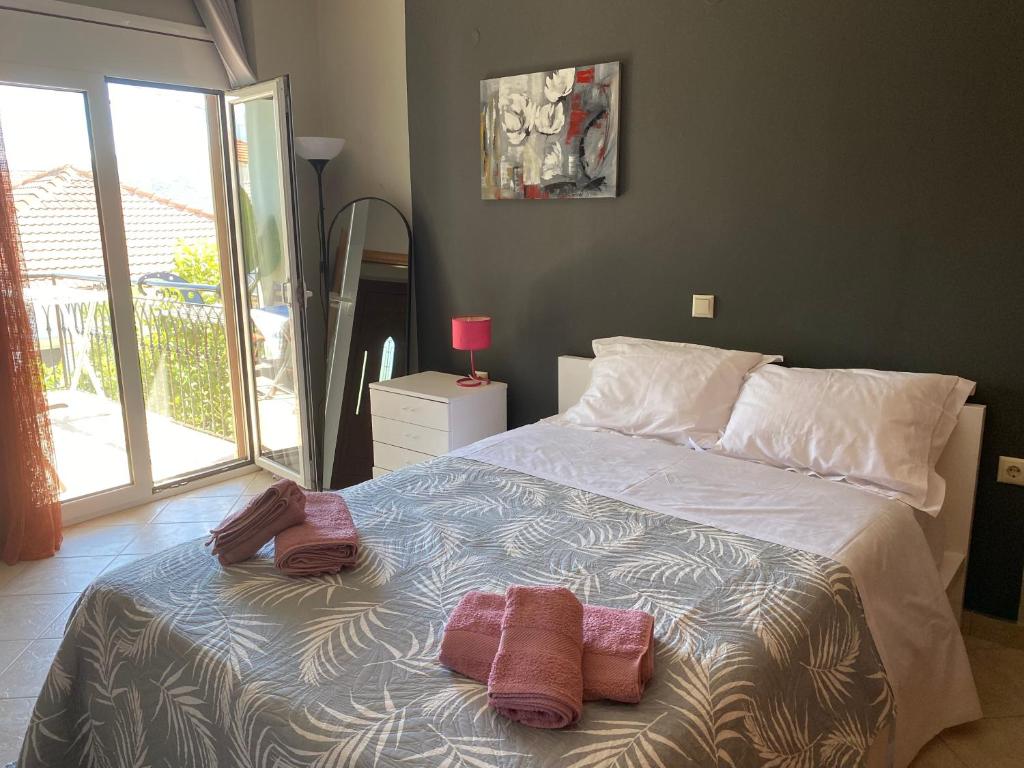 Postel nebo postele na pokoji v ubytování LenasApartment