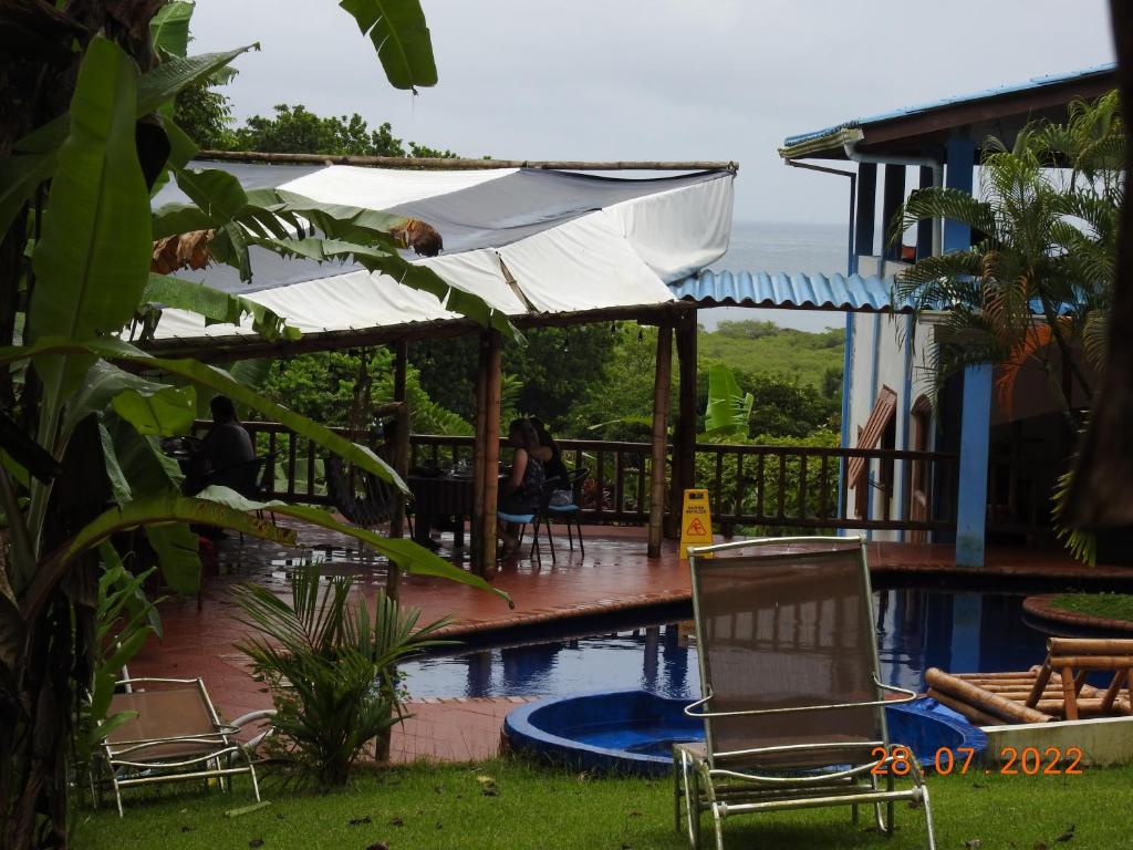 Bazén v ubytování VISTA CARIBE nebo v jeho okolí