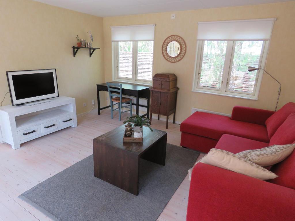 TV a/nebo společenská místnost v ubytování Ljunghusen Guesthouse