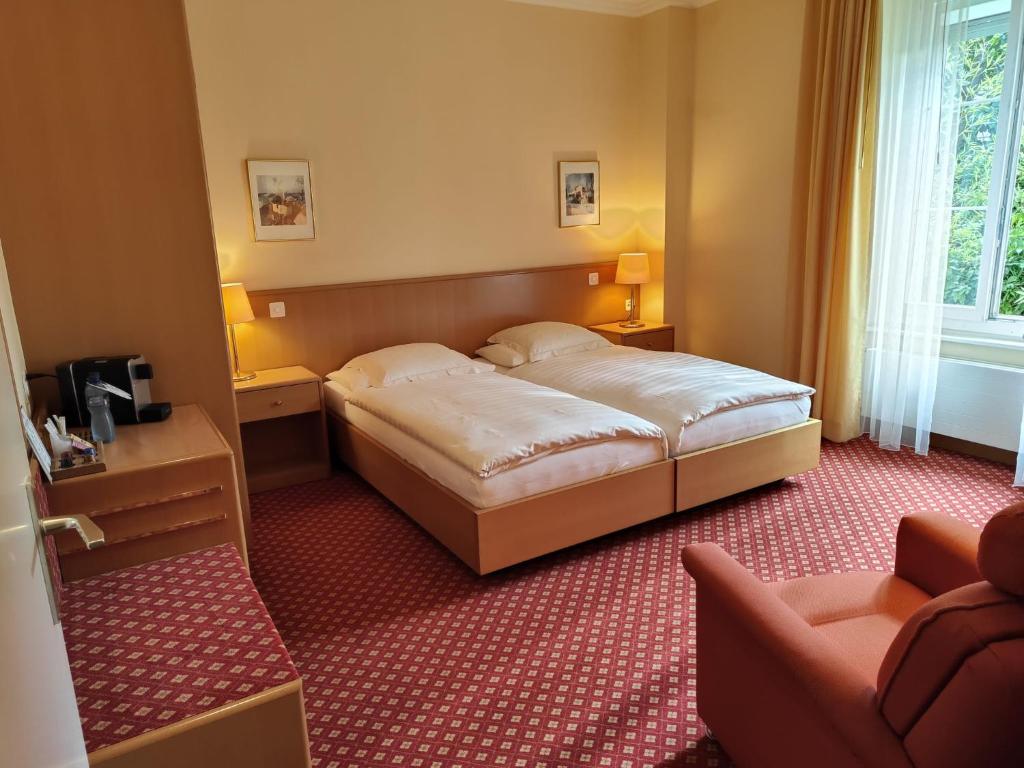 Uma cama ou camas num quarto em Elite