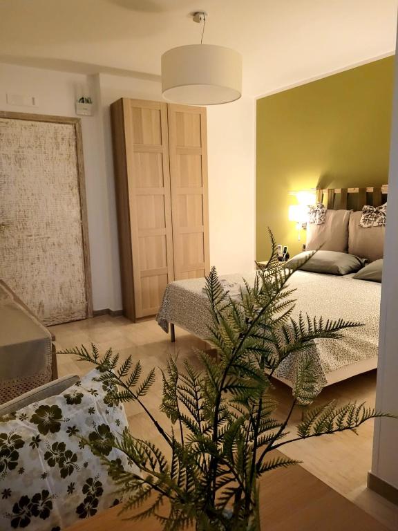 Postel nebo postele na pokoji v ubytování Pompei Suite