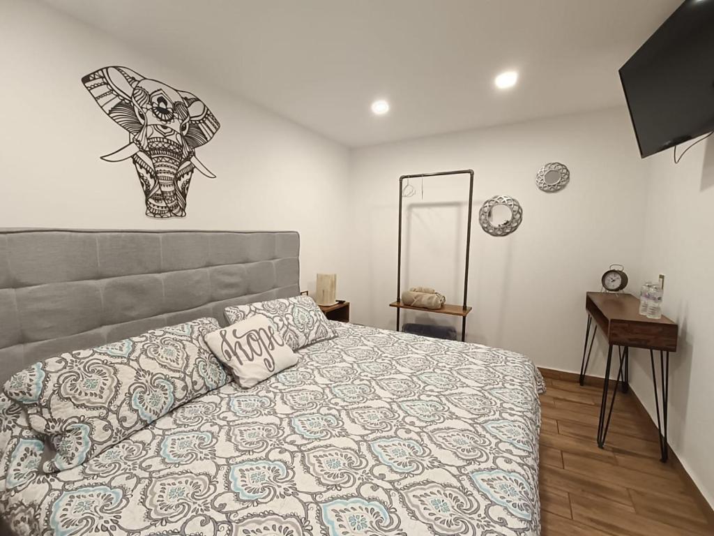 Postel nebo postele na pokoji v ubytování Mantra Glamping & Chalets
