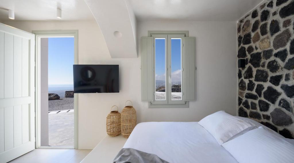 Postel nebo postele na pokoji v ubytování Terra Blanca Suites