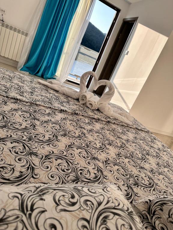 Postel nebo postele na pokoji v ubytování Villa Adam