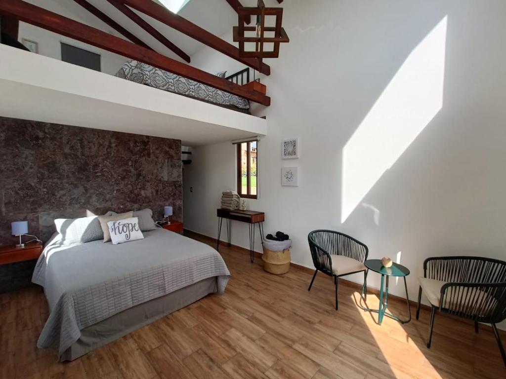 Postel nebo postele na pokoji v ubytování Mantra Glamping & Chalets