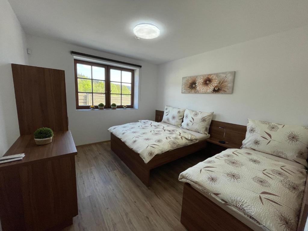 Voodi või voodid majutusasutuse Apartmány Lipka toas