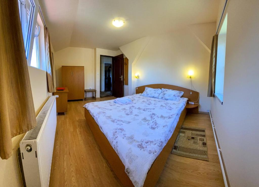 Postel nebo postele na pokoji v ubytování Casa Popa