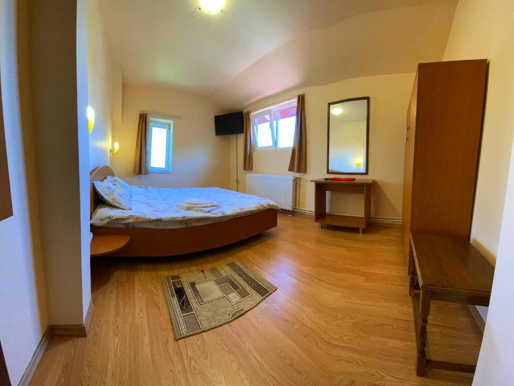 Postel nebo postele na pokoji v ubytování Casa Popa