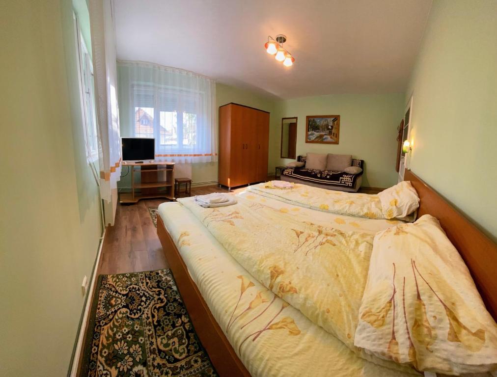 Postel nebo postele na pokoji v ubytování Casa Popa