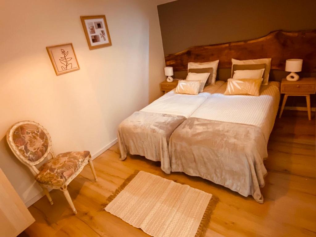 Postel nebo postele na pokoji v ubytování L'ESCALE