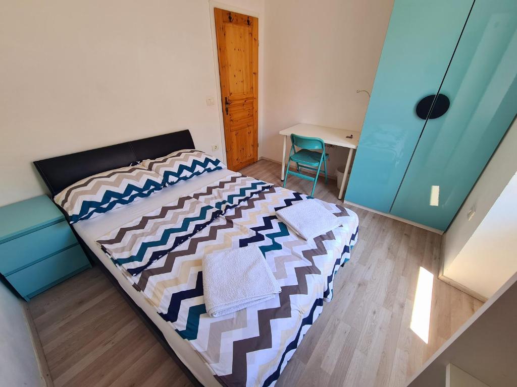 Postel nebo postele na pokoji v ubytování Koper2stay