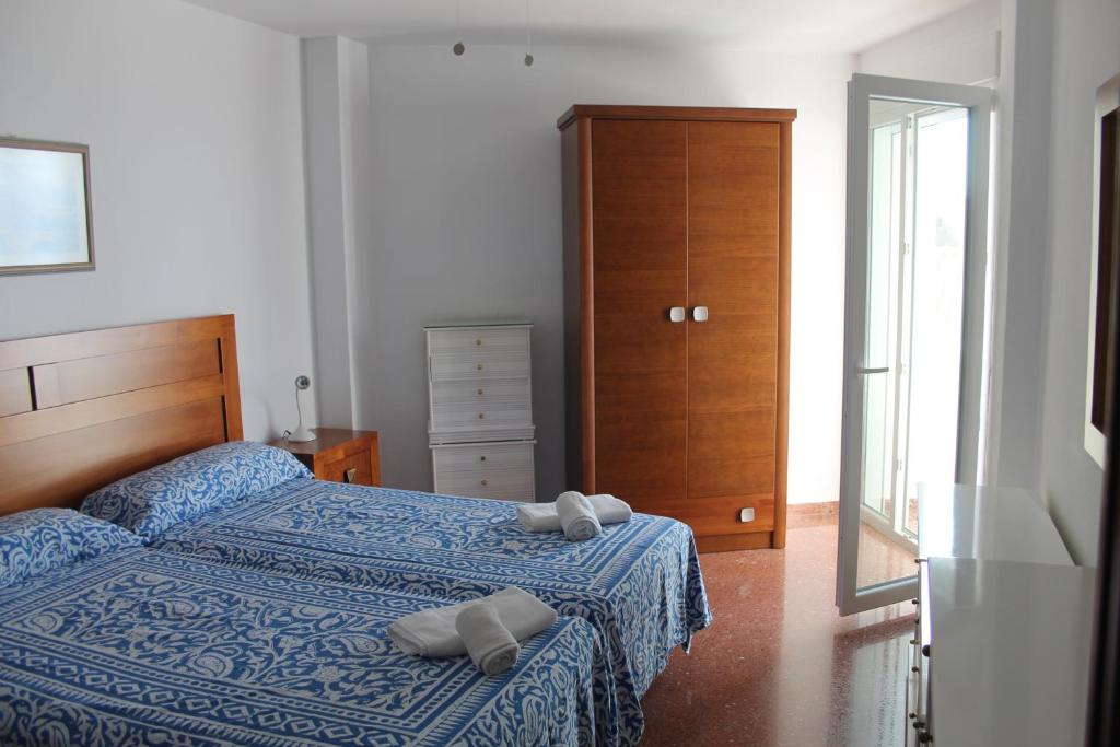 Postel nebo postele na pokoji v ubytování Torresol406