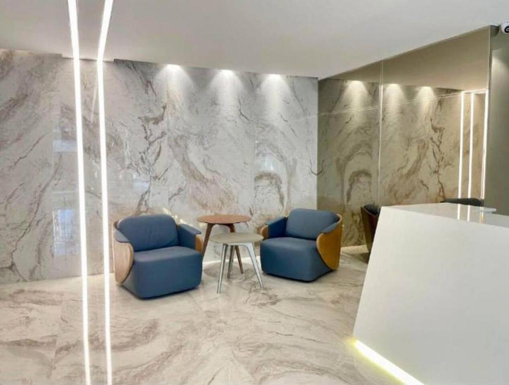 Ein Sitzbereich in der Unterkunft Departamento en zona Residencial con Parqueo