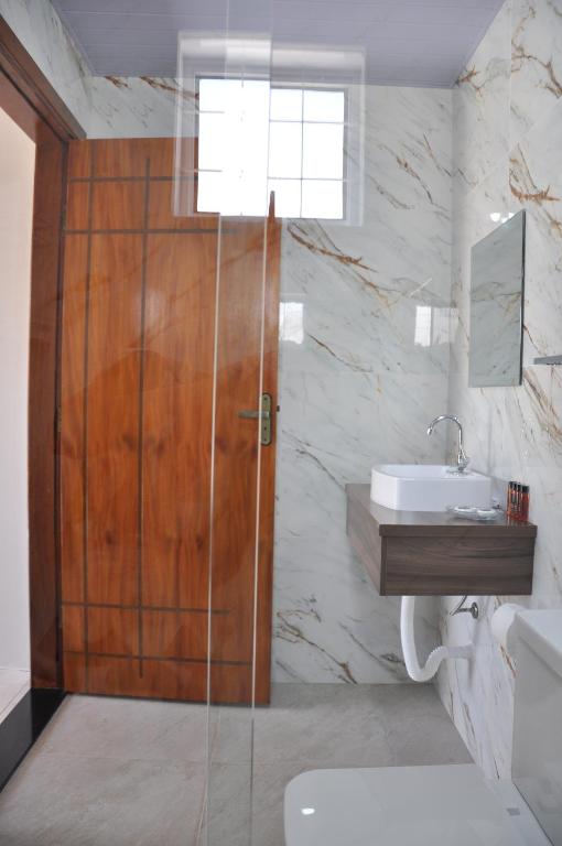 Koupelna v ubytování Pousada Suites Bougainville