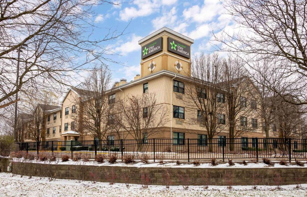 a building with a clock tower on top of it at Extended Stay America Suites - Chicago - Schaumburg - I-90 in Schaumburg