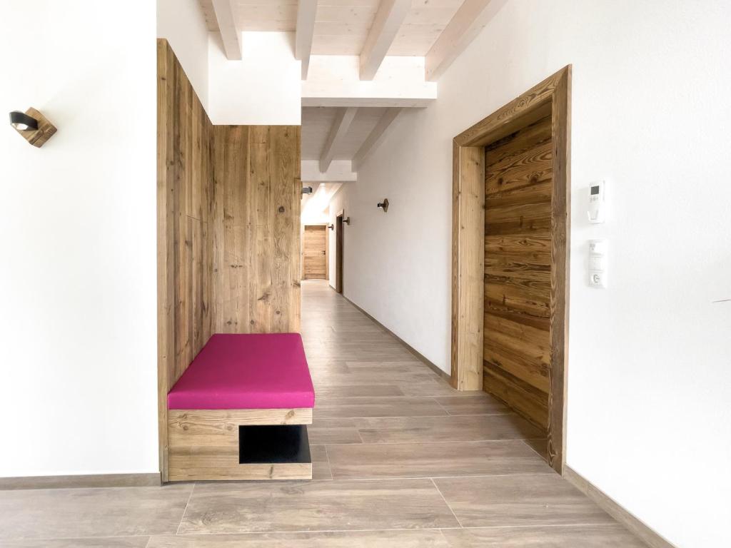 A bed or beds in a room at CLOUD 9 - Private Roof Terrace with Whirlpool by AlpenLuxus Appartements
