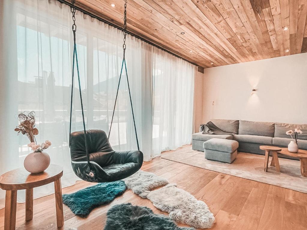 A seating area at CLOUD 9 - Private Roof Terrace with Whirlpool by AlpenLuxus Appartements