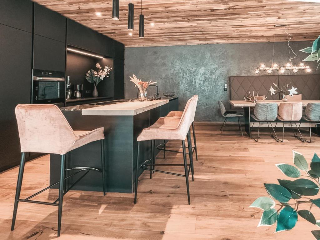 A kitchen or kitchenette at CLOUD 9 - Private Roof Terrace with Whirlpool by AlpenLuxus Appartements