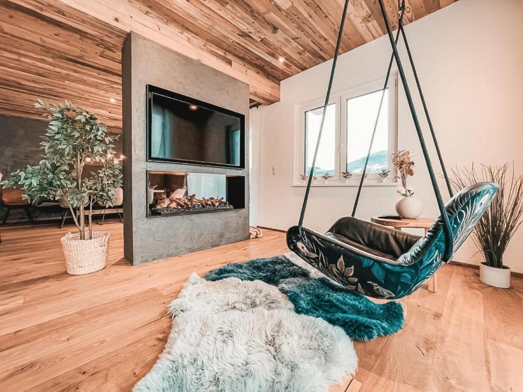 A seating area at CLOUD 9 - Private Roof Terrace with Whirlpool by AlpenLuxus Appartements
