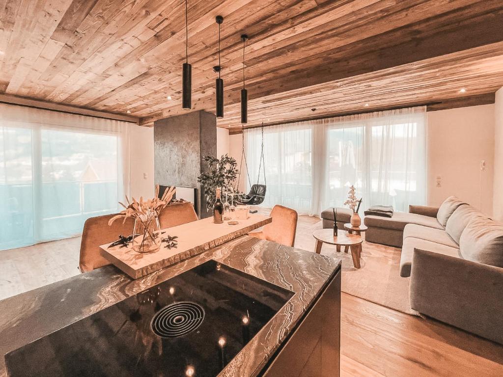 A seating area at CLOUD 9 - Private Roof Terrace with Whirlpool by AlpenLuxus Appartements