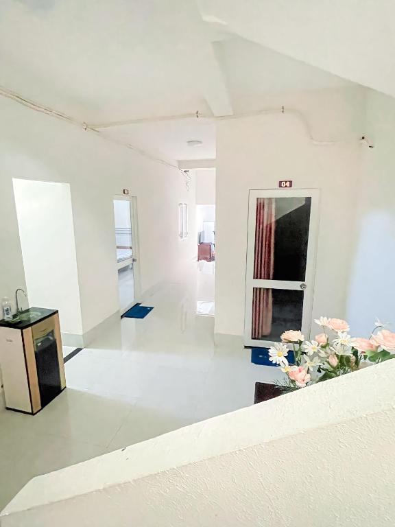 Giường trong phòng chung tại Kim Long Hotel