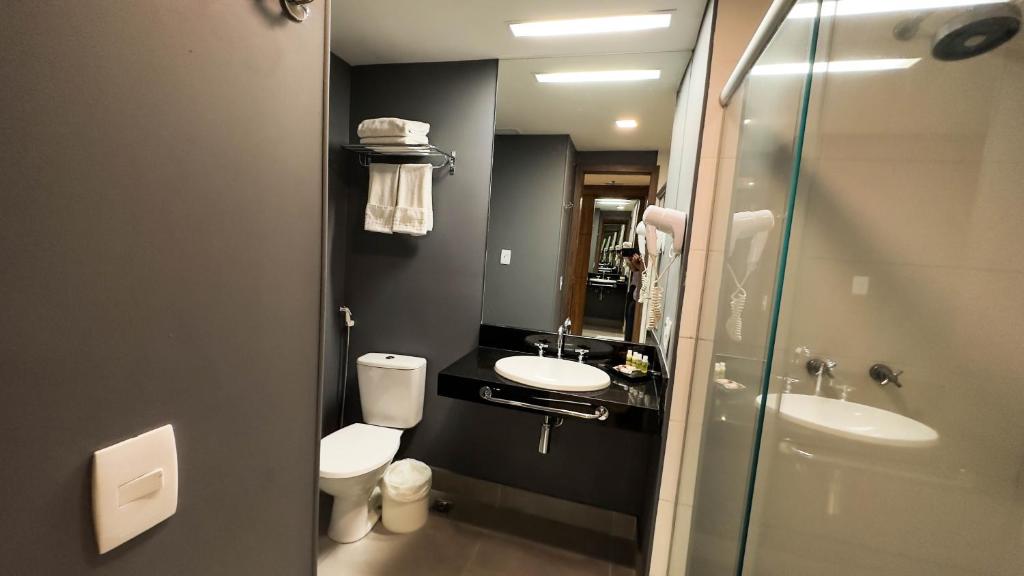 Um banheiro em Hotel Vivenzo Savassi Belo Horizonte