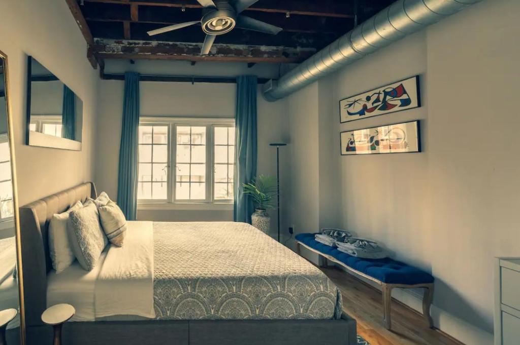 a bedroom with a bed and a ceiling fan at StayRafa At 253 3F in Philadelphia