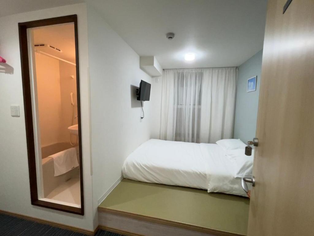 Postel nebo postele na pokoji v ubytování da inn