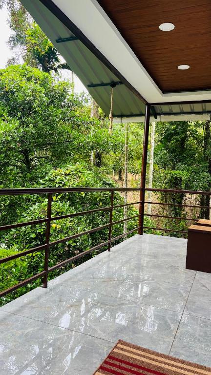 Balkón nebo terasa v ubytování Cave Valley Wayanad